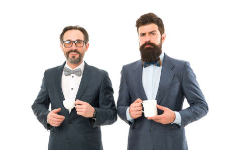 Make pause drink tea. Enjoying office coffee. Business people coffee break. Coffee time pleasant office life moment. Men bearded guys relaxing coffee break business conference. Inspiring drinkの写真素材