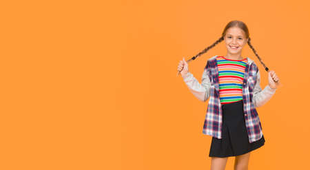 Preteen girl colorful clothes. Childrens shop store mall. Adorable girl beautiful face. Hairdresser...