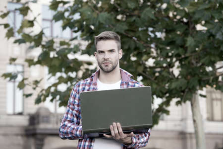 Urban WiFi. Digital solution for business. Entrepreneur developer inspired by nature. Man developer hold laptop. Inspired for start up. Handsome guy with computer. Web developer. Software conceptの写真素材