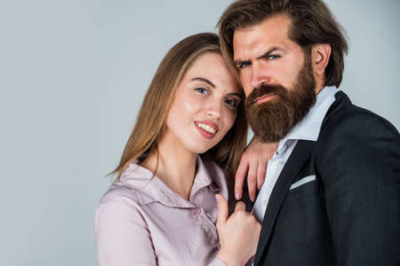 Love time. mature man with girlfriend. romantic relationship and dating. copy space. couple in love. sexy formal couple. bearded man and woman embrace. fashion and beauty. valentines day for themの写真素材
