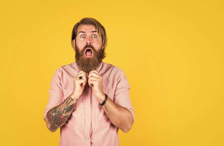 scared and surprised brutal man. Facial care. Mature hipster with beard. brutal caucasian hipster with moustache. Male barber care. Bearded man. Hair and beard care. wow it is incredibleの写真素材