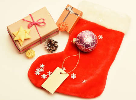 Small items stocking stuffers or fillers little christmas gifts. Christmas sock white background top...