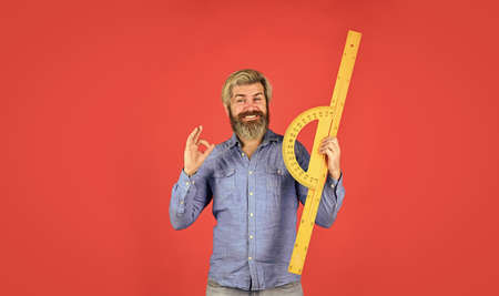 Long or short. Bearded man use ruler. Education concept. Study hard. School classes. Measurement...