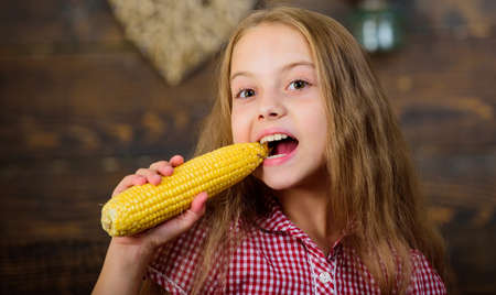 Child little girl enjoy farm life. Organic gardening. Grow your own organic food. Kid farmer with...