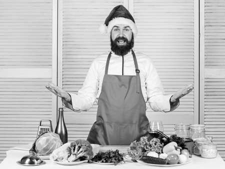 santa man cooking. Vegetarian salad with vegetables. Dieting organic food. Happy bearded man. chef recipe. Healthy food cooking. Mature hipster with beard. Cuisine culinary. Vitamin. Are you readyの写真素材