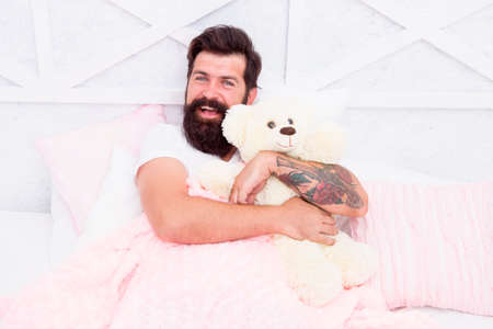 Enjoying nice morning. happy hipster with favorite bear toy. happy wake up in the morning. good...