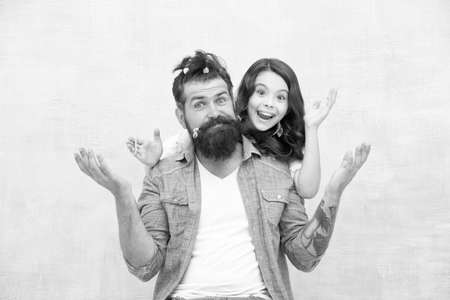 Smile if you are happy. Happy family. Happy father and little daughter. Bearded man and small child happy smiling together. Happiness and joy. Hair beauty salonの写真素材