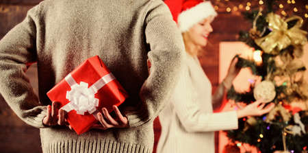Sincere emotions. couple in love santa hat. Time for presents. happy new year. family holiday. man...