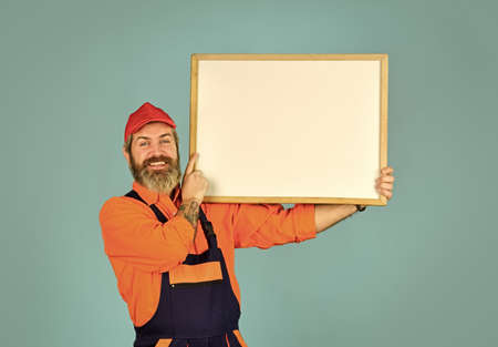 Builder points to flipchart. Architect Worker hold Flip Chart. Conference Meeting. person presenting...