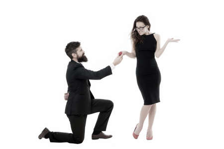 Last romantic on the Earth. Why do men get down on one knee to propose. Proposal of marriage concept. Man hold red box romantic proposal. Will you marry me. Ideas for unique marriage proposalの写真素材