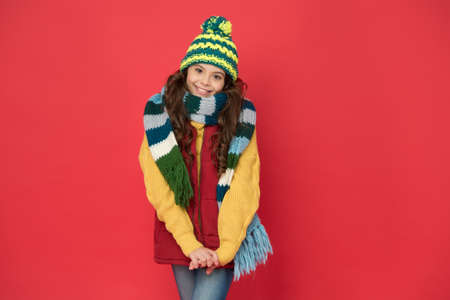 stylish child in knitwear care health in cold season, knitted garmentsの写真素材