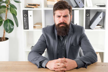 Modern businessman. Confident brutal man at job interview. Bearded man. Mature hipster. Businessman in formal suit. serious man on job interview. Male in business officeの写真素材