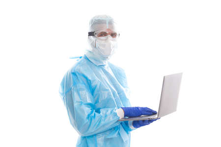 medical worker man in protective costume isolated on white keep safe of covid19 sars virus pandemic working from home on computer online, coronavirus self-isolationの写真素材
