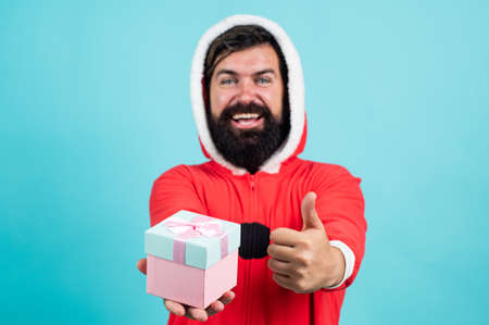 Be happy. buy xmas gifts. amzed santa man hipster with gift box. preparation and celebration. funny...
