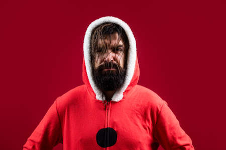 being in bad mood. brutal santa man hipster. preparation and celebration. party time. happy winter holidays. new year mood. christmas shopping. sales and discounts. buy xmas giftsの写真素材