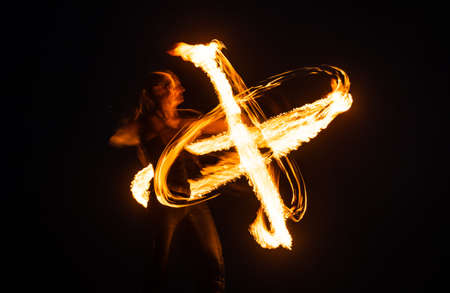 Must-see event. Sexy woman perform infinite spirals in darkness. Art of poi spinning. Fire...