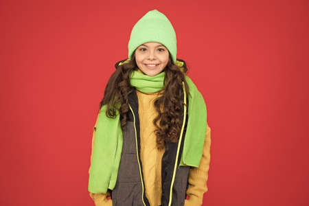 Bright accessory. Small adorable girl in knitted hat. Winter weather forecast. Wear warm clothes....