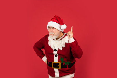 are you ready. enjoy the winter holiday. delivery new year gifts. Christmas online shopping. santa claus with white beard. man in santa hat prepare christmas present. The morning before Xmasの写真素材