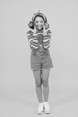 Happy girl sweet muffins cafe, bakery shop conceptの写真素材