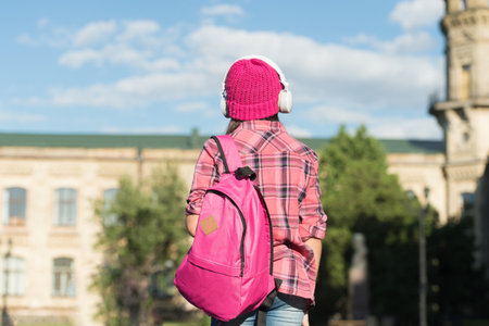 Adventure is out there. Little child carry travel bag outdoors. Vacation travel. Summer holidaysの写真素材