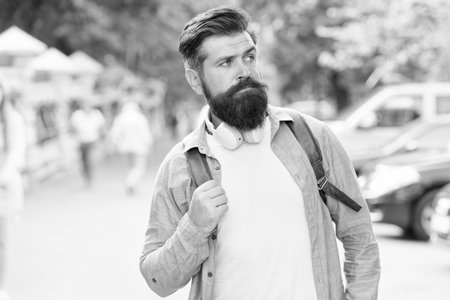 Long beard is style for him. Bearded man travel urban outdoors. Hipster with stylish beard hair. Beard barber. Beard grooming. Skincare. Haircare. Barbershop. Maintaining masculine lookの写真素材