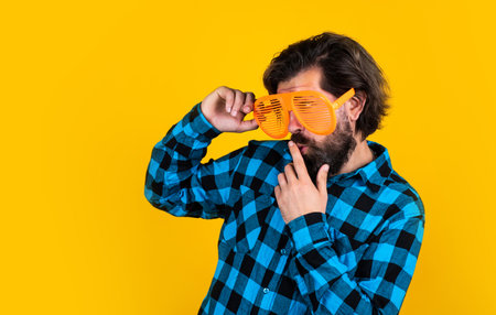 keep the secret. cool fashioned bearded hipster. having fun concept. brutal handsome man with...