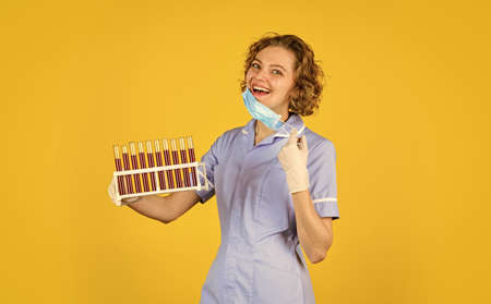 examining test tube. medical technologist making testing with test tube. research in science...