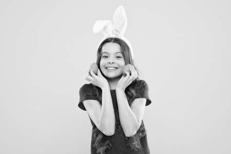 Happy spring holiday of easter. healthy and happy. childhood happiness concept. Ready to Easter. little girl child wear bunny ears. happy easter. Bunny celebration on easter dayの写真素材