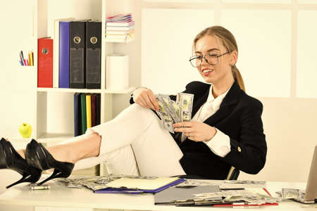 Woman counting money. Accountant office. Financial success. Tax service. Business investment....