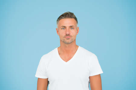 Super dude. Man abstract blue background. Caucasian middle age man. Handsome man in casual style....