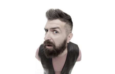 Hey you there. Masculinity and brutality. Lumbersexual well groomed hipster looking at camera. Hipster with mustache and long beard. Man mature bearded muscular brutal hipster white backgroundの写真素材
