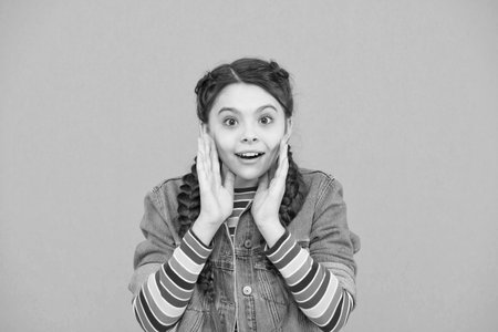 Skincare like you mean it. Beauty look of little child. Happy girl green background. Skincare routine. Baby skincare. Skin care products and cosmetics. Because your skin mattersの写真素材