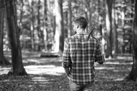 forester walk in forest with axe, natureの写真素材