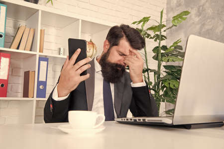 Crisis solution. Crisis management. Crisis concept. Communicating with clients. Arrange supply materials and goods. Businessman phone conversation. Mobile call negotiations. Logistics departmentの写真素材