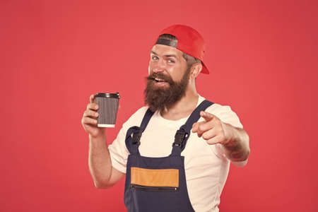 Builder enjoy coffee. Handsome builder hold coffee cup. Man protective uniform. Let Me Get My...