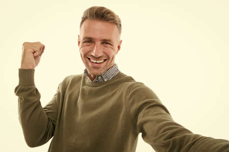 Happy winner. Happy guy make winner gesture isolated on white. Happy celebration. Pleasure and joy. Fun and entertainment. Cool mood. Happiness. Choose happy. Its a good dayの写真素材