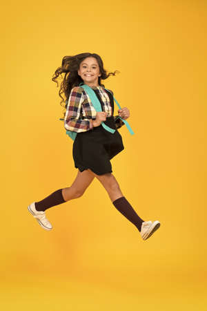 Break into next academic year. Backpack fashion accessory. Girl cheerful face carry backpack. Daily school life. Inspired for studying. Teen fashion. Schoolgirl modern clothes with cute backpackの写真素材