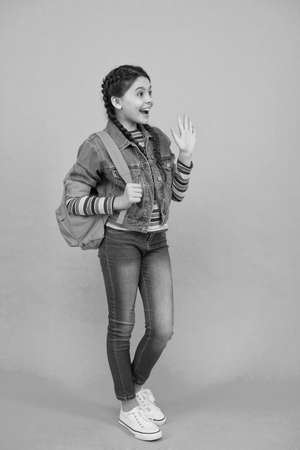 Happy kid blue background. Little child in casual style. Fashion trends. Trendy style. Casual wardrobe. Everyday clothing. Children's clothes. Casual and streetwear inspired fashionの写真素材