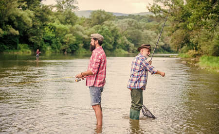 Get Hobby. hobby and sport activity. Trout bait. male friendship. family bonding. two happy...