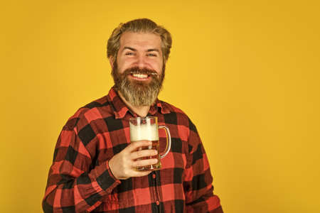 Get drunk. Alcoholic. Thirsty man drinking beer in pub bar. Beer with foam. Hipster drink beer....