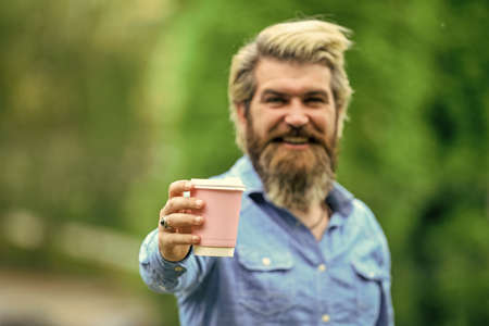 Personal cup. Third wave coffee. Caffeine dose. Man drinking coffee. Man drink coffee background defocused. Take away coffee. Paper cup. Joy and pleasure. Cafe and restaurant. Safety measuresの写真素材