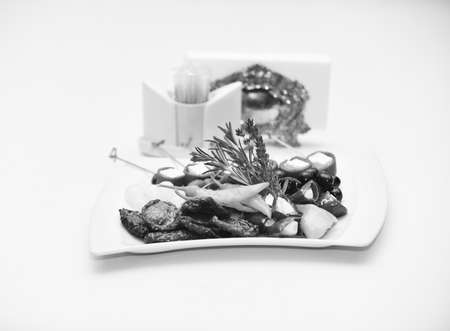 Vegetarian food concept. Vegetarian dish with pickled vegetables decorated with herbs.