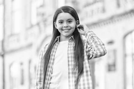 Treat your hair today. Happy girl wear long hairstyle. Hair salon. Kids barber. Beauty salon. Salon...