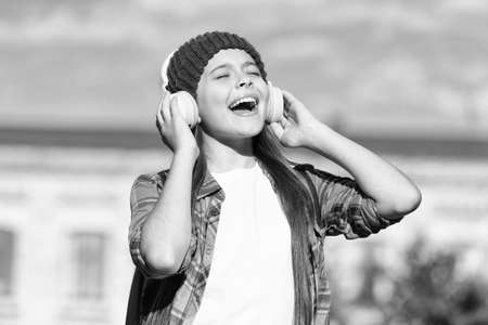 Dont compromise on sound. Happy child listen to music with closed eyes. Hi-Fi stereo sound. Music and sound technology. Modern life. Fun and entertainment. Bringing joy through soundの写真素材