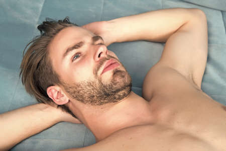 Guy with beard on unshaven face and sexy bare chestの写真素材