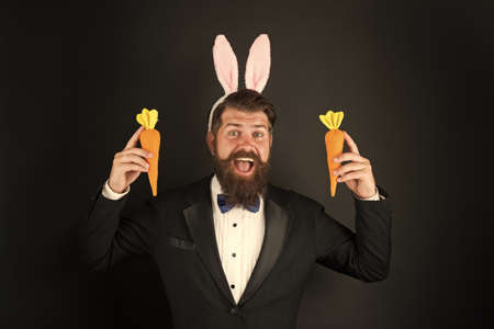 Happy elegant businessman wear rabbit ears. Rabbit costume party. Bunny or hare. Easter symbol....