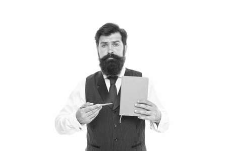 Serious bearded man point writing pen at school book isolated on white, information about educationの写真素材