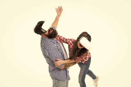Vr family concept. Father and daughter in vr glasses. Modern technology. Digital innovation. Dad and girl virtual reality. Imagination and cyber space. Future technologies. Having fun. Video gamesの写真素材