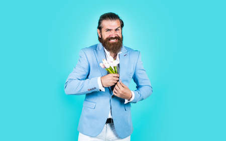Last details. concept of flower shop. man with beard and stylish hair. holiday and celebration....