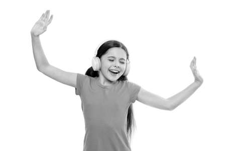 Play any song. Try premium account. Enjoy nonstop music. Privilege of premium music account. Little girl listen music modern headphones. Small kid listen music headphones. No ad interruptionsの写真素材